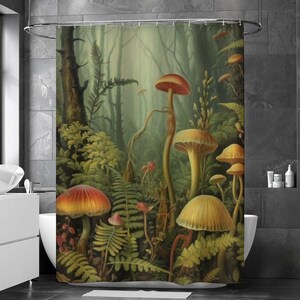 May include: A shower curtain featuring a colorful illustration of mushrooms growing in a lush green forest. The mushrooms are various shades of red, orange, and yellow, with some having white spots. The forest is filled with ferns and other foliage.