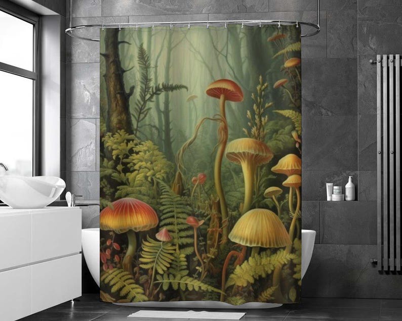 May include: A shower curtain featuring a colorful illustration of mushrooms growing in a lush green forest. The mushrooms are various shades of red, orange, and yellow, with some having white spots. The forest is filled with ferns and other foliage.