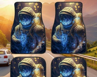 May include: Set of four custom car floor mats featuring an astronaut design. The mats have a black border and a detailed image of an astronaut in a space suit with a blue and gold color scheme. The text "CUSTOM CAR FLOOR MATS (SET OF 4)" is at the top.