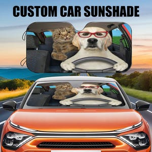 Kat en hond rijdende auto zonnescherm, grappige voorruit afdekking blocker auto beschermer venster vizier schermafdekking, cadeaus voor hond kat huisdierliefhebbers