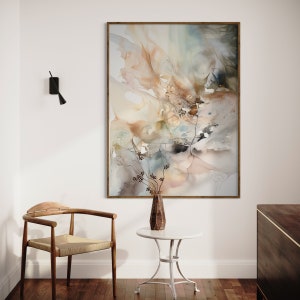 Abstract watercolor painting hanging on a wall in a room
