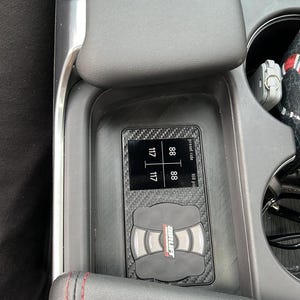May include: A black and gray air suspension control panel with a digital display showing the pressure in PSI. The display shows "present ride" and "168 PSI" with the pressure readings of "88", "88", "117", and "117".