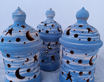 Handmade ceramic candle holder in the shape of a lantern