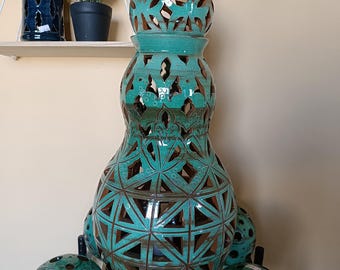 Handcrafted, designer ceramic lamp, made up of three pieces and with a ceramic light bulb holder. Turquoise decor.