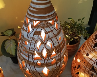 Handmade ceramic lamp with a pyramid shape ending in a point, with a ceramic support installed for light bulbs.