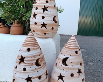 Handmade ceramics from Andalusia. Handmade lantern or lamp with a pyramid shape and decoration of stars and moons.