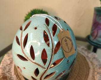 Turquoise collection candle holder, ball model and openwork vine.