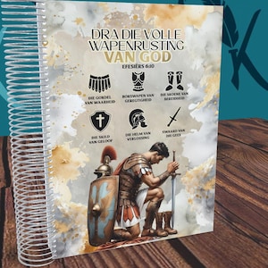 May include: A spiral bound notebook with a watercolour background featuring a Roman soldier kneeling in prayer. The cover text reads "DRA DIE VOLLE WAPENRUSTING VAN GOD EFESIËRS 6:10" and includes a list of the armour of God in Afrikaans.