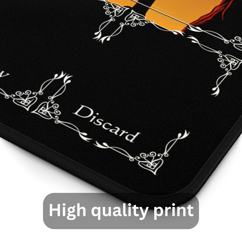 May include: Black mouse pad with white decorative borders and the word "Discard" in white text.