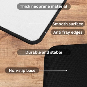 May include: Close-up of a black and white mat with the text "Thick neoprene material", "Smooth surface", "Anti fray edges", "Durable and stable", and "Non-slip base". The mat has a black border and a textured black bottom.