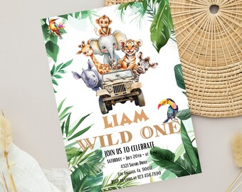 May include: A jungle-themed first birthday party invitation with a watercolor illustration of a jeep full of animals, including a giraffe, elephant, tiger, rhino, and monkey. The text reads "Liam Wild One" and includes the date, time, and location of the party.