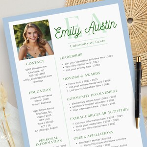 May include: A resume template with a photo of a woman, light blue and white background, and green accents. The resume includes sections for contact information, education, leadership, honors, community involvement, extracurricular activities, and Greek affiliations.