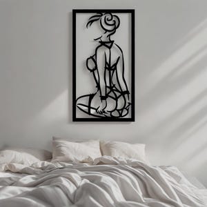 Minimalist black line art wall decor featuring elegant feminine silhouette in lingerie, modern erotic wall art in contemporary frame design