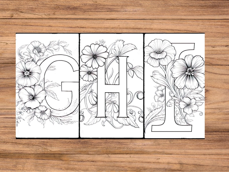 May include: Black and white printable coloring page featuring the letters G, H, and I with floral designs. The letters are surrounded by flowers and leaves.