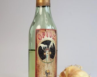 Small vintage glass pharmacy bottle with custom label "Opium"