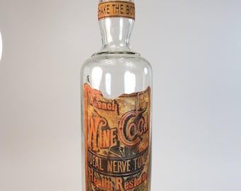 Vintage empty glass bottle with custom label creation "French Wine Coca"