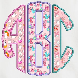 May include: A set of three monogram letters, A, B, and C, in a circle shape. The letters are outlined in pink, purple, and teal. The background is a pink pattern of bunnies, eggs, and flowers.