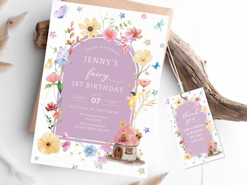May include: A purple and white invitation with a watercolor illustration of a fairy house, flowers, and fairies. The text reads "Join us to celebrate Jenny's fairy 1st birthday, Monday Sept 07, 4 o'clock in the evening, 123 anywhere st, city, st 12345, RSVP to Natasha at 123-456-7890 by May 10th". A matching thank you tag reads "Thank you for coming & making my day special".
