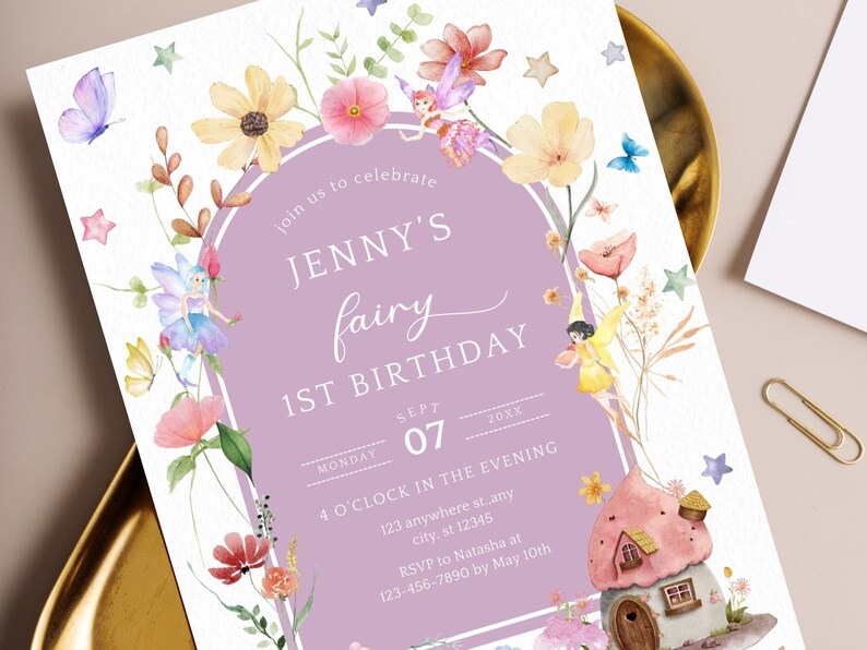 May include: A purple and white invitation with watercolor flowers and fairies. The text reads "Join us to celebrate Jenny's fairy 1st birthday, Monday, Sept 07, 20XX, 4 o'clock in the evening, 123 anywhere st, any city, st 12345, RSVP to Natasha at 123-456-7890 by May 10th".