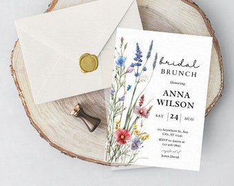 May include: A white card with a floral design and the text "bridal brunch" honoring Anna Wilson on Saturday, August 24th. The card includes an address and RSVP information.