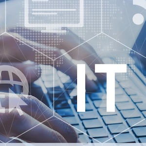 May include: A business proposal for outsourced IT and managed services. The image shows a person typing on a laptop with the word "IT" in large white letters in the foreground.