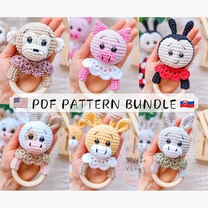 May include: PDF pattern bundle for crocheting six different animal rattle toys. The animals include a monkey, pig, ladybug, cow, giraffe, and donkey. Each animal has a different color scheme and features a cute face with embroidered details. The rattles are attached to wooden rings.