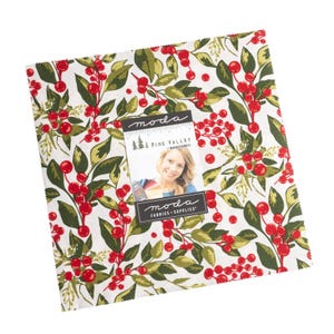May include: A white fabric with a red berry and green leaf pattern. The fabric has the text "Moda Fabrics & Supplies" and "Pine Valley" by BasicGrey.