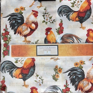 May include: A fabric square featuring a Garden Gate Roosters print by Susan Winget. The pattern displays multiple roosters with orange, red, and black plumage, interspersed with yellow sunflowers, white blossoms, and red flowers on a light background.