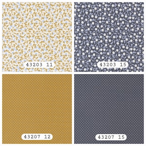 May include: Four fabric swatches featuring two floral patterns and two polka dot patterns. Top left: 43203 11 with light blue flowers and gold leaves on white. Top right: 43203 15 with white flowers on dark gray. Bottom left: 43207 12 gold with white dots. Bottom right: 43207 15 dark gray with white dots.
