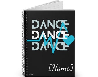 May include: Black spiral notebook with a blue and white heart and the words "DANCE" repeated three times with a blue EKG line. The text "[Name]" is at the bottom of the notebook.