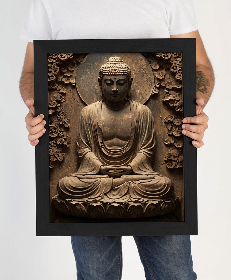 May include: A framed print of a brown Buddha statue sitting in a meditative pose. The statue is surrounded by a carved floral design.