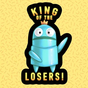 Może przedstawiać: Niebieska postać z kresk&oacute;wki z koroną na głowie i tekstem "KING OF THE LOSERS!" wok&oacute;ł niej. Postać macha prawą ręką.