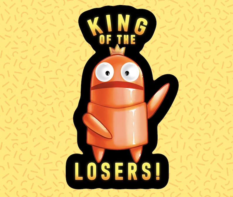 Może przedstawiać: Naklejka z pomarańczowym robotem z kresk&oacute;wki, kt&oacute;ry nosi koronę i napis "King of the Losers!"