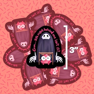 May include: A set of 3-inch stickers featuring a black ghost with a white face and a red creature with a white face. The stickers have the text "Erm... It's right behind me isn't it?" repeated around the edges.