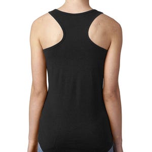 May include: A black racerback tank top with a relaxed fit. The tank top is made of a soft, comfortable fabric and has a slightly longer length in the back.