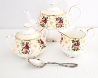 Royal Albert “Rose Cameo Peach” Teapot / Creamer / Covered Sugar Bowl