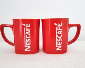 Set of Two Classic Red Nescafé Mugs, Square Base, Straight Sides, Vertical Logo
