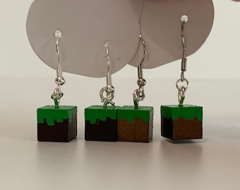 Pendientes de bloque de hierba de Minecraft