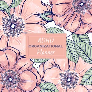 Op de afbeelding: Een roze en groen bloemenontwerp met de tekst "ADHD ORGANIZATIONAL PLANNER" in een witte doos.