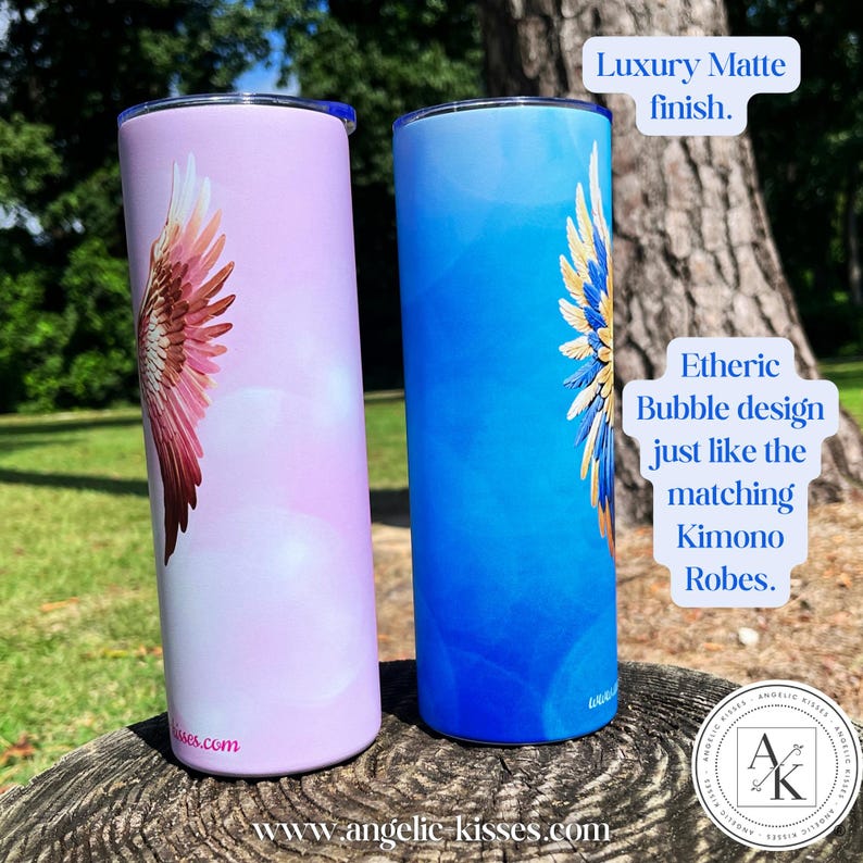 May include: Two insulated tumblers with a matte finish. One is light purple with a wing design in shades of pink and red. The other is blue with a gold and blue wing design. The text on the tumblers says "Luxury Matte finish" and "Etheric Bubble design".