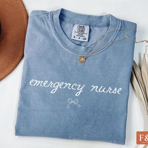 Comfort Colors Bow Emergency Department T-Shirt, Trendy Nurse Shirt, Popular ED Outfit, Gifts For New Nurse, Woman Health Department Tee
