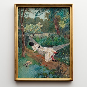 May include: A framed painting depicts a person resting in a hammock. The person is wearing a white dress and black shoes. The painting has a gold frame and is set in a lush garden with trees and flowers.