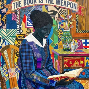 May include: A mixed-media artwork featuring a Black woman reading a book. She is wearing a blue patterned dress and seated in a wooden chair. The background is a collage of colorful patterns, with the text "THE BOOK IS THE WEAPON" across the top.