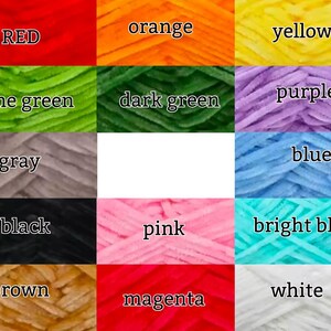May include: A color chart of yarn samples in various colors, including red, orange, yellow, lime green, dark green, purple, blue, gray, black, pink, bright blue, brown, white, and magenta.