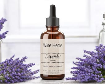 Puede incluir: Una botella de vidrio marrón con un gotero, etiquetada "Wise Herbs Lavender Calming Organic French Lavender Net Wt. 1 oz - 29 ml (2 oz - 58 ml) www.terraherbs.com".