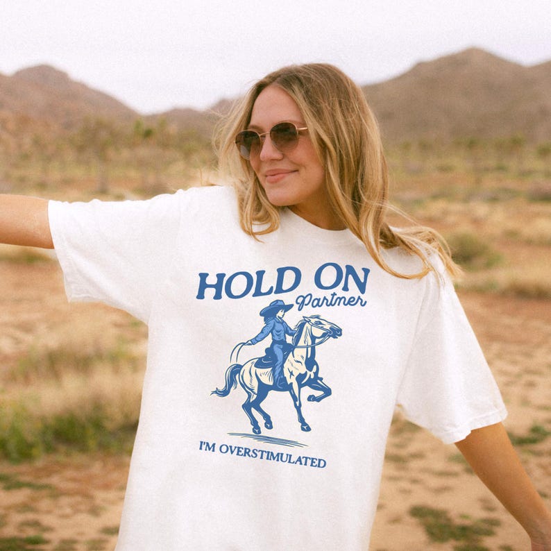 Hold On Partner I'm Overstimulated Shirt Comfort Colors Unhinged Shirts Weirdcore Clothing Vintage Cowgirl Aesthetic Funny Meme Shirt image 1