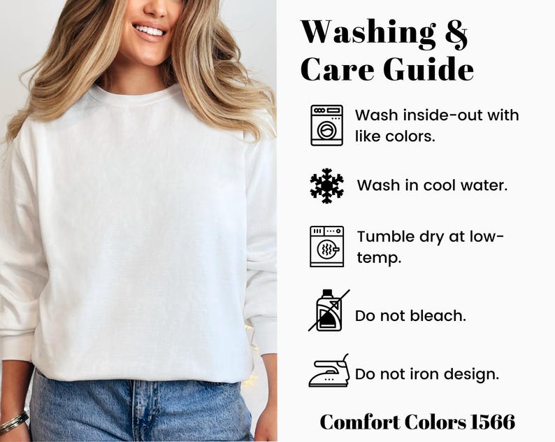 Op de afbeelding: Een witte Comfort Colors 1566 sweatshirt. De afbeelding bevat een was- en verzorgingsgids met instructies: binnenstebuiten wassen met dezelfde kleuren, wassen in koud water, in de droger op lage temperatuur, niet bleken en het ontwerp niet strijken.