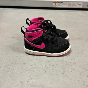 Pink and black baby jordans hotsell