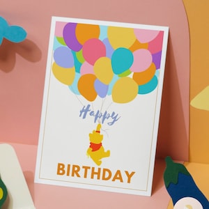 Carte d'anniversaire numérique imprimable pour enfants avec Winnie l'ourson avec des ballons colorés
