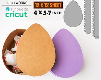 May include: A printable template for an Easter egg candy box. The template is designed to be cut out and assembled into a 3D box. The template includes a brown egg shape, a purple egg shape, and two tabs with scalloped edges. The template is designed to be used with a 12x12 inch sheet of paper and measures 4x5.7 inches.